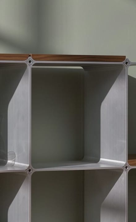 Shelf in silver, detail with node and wooden shelf in walnut