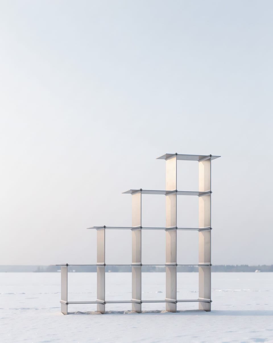 Shelf in silver, stepped, on a snow-covered lake in the haze